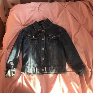 Dark blue jean jacket.